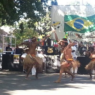 Brazilian Day Sacramento Street Festival: Brazilian Folkloric Maculele Dancers and Brazilian Samba Dancers with little girl from the community.